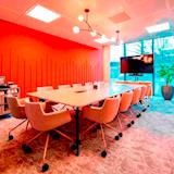 Situated in the Hive area of building. seats 14 people